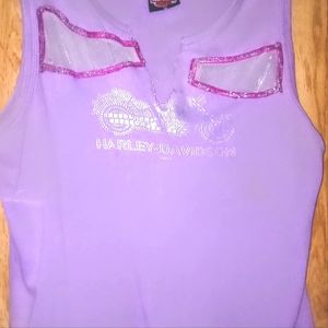 Official Harley Davidson Tank. It's been modified. 2 openings to view breasts